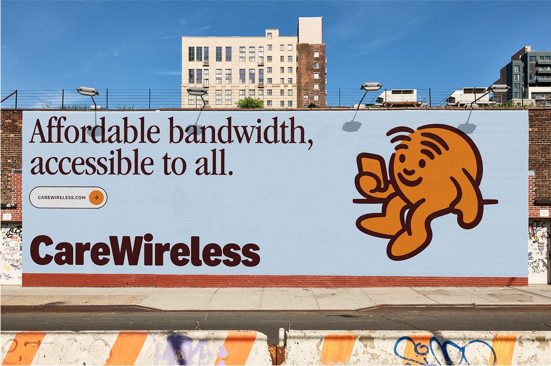 Care Wireless brand identity colour system showing light blue palette and warm orange accents on billboard