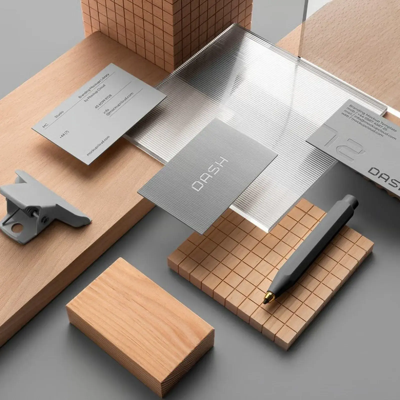 Dash brand identity mockups full desk flatlay with pen and wood block
